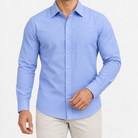 Slim cotton blend shirt with a chest pocket in light blue patterned on a male model front view