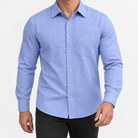 Slim cotton blend shirt with a chest pocket in blue windowpane on a male model front view