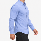 Slim cotton blend shirt with a chest pocket in blue windowpane on a male model side view