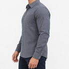 Slim cotton blend shirt with a chest pocket in charcoal patterned on a male model side view