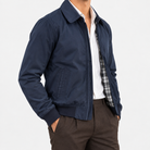 Collared zip jacket with check lining in navy, side view on a model