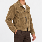 Cotton corduroy trucker jacket in khaki, side view on a model