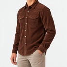 Cotton corduroy western shirt in chestnut, side view on a model