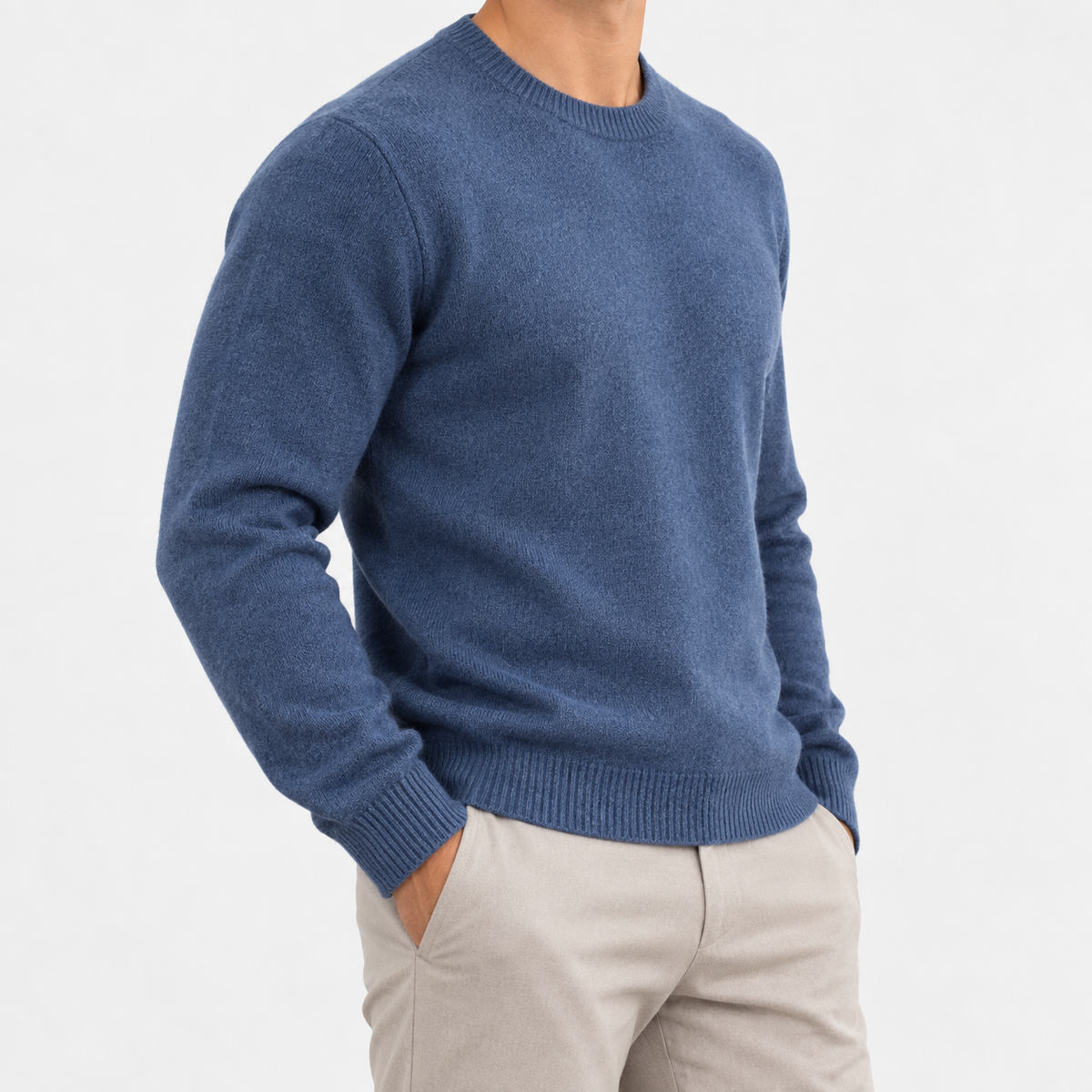 Fine knit wool crew neck sweater in denim blue, side view on a model