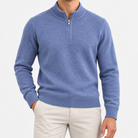 Fine knit wool quarter zip sweater in dusty blue, front view on a model