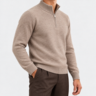 Fine knit wool quarter zip sweater in taupe, side view on a model