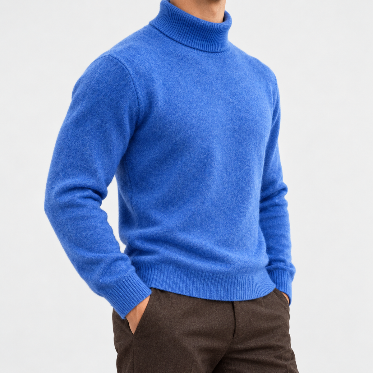 Fine knit wool turtleneck sweater in blue, side view on a model