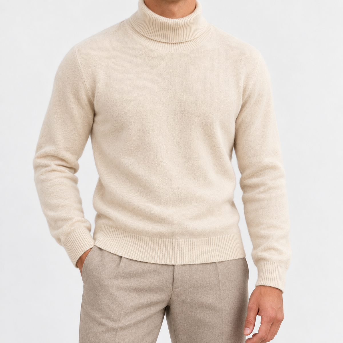 Fine knit wool turtleneck sweater in cream, front view on a model
