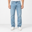 Light wash cotton blend straight jeans in light blue, front view on a model