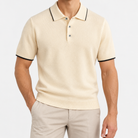 Merino wool polo with contrast trim in cream, front view on a model