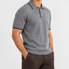 Merino wool polo with contrast trim in gray, side view on a model