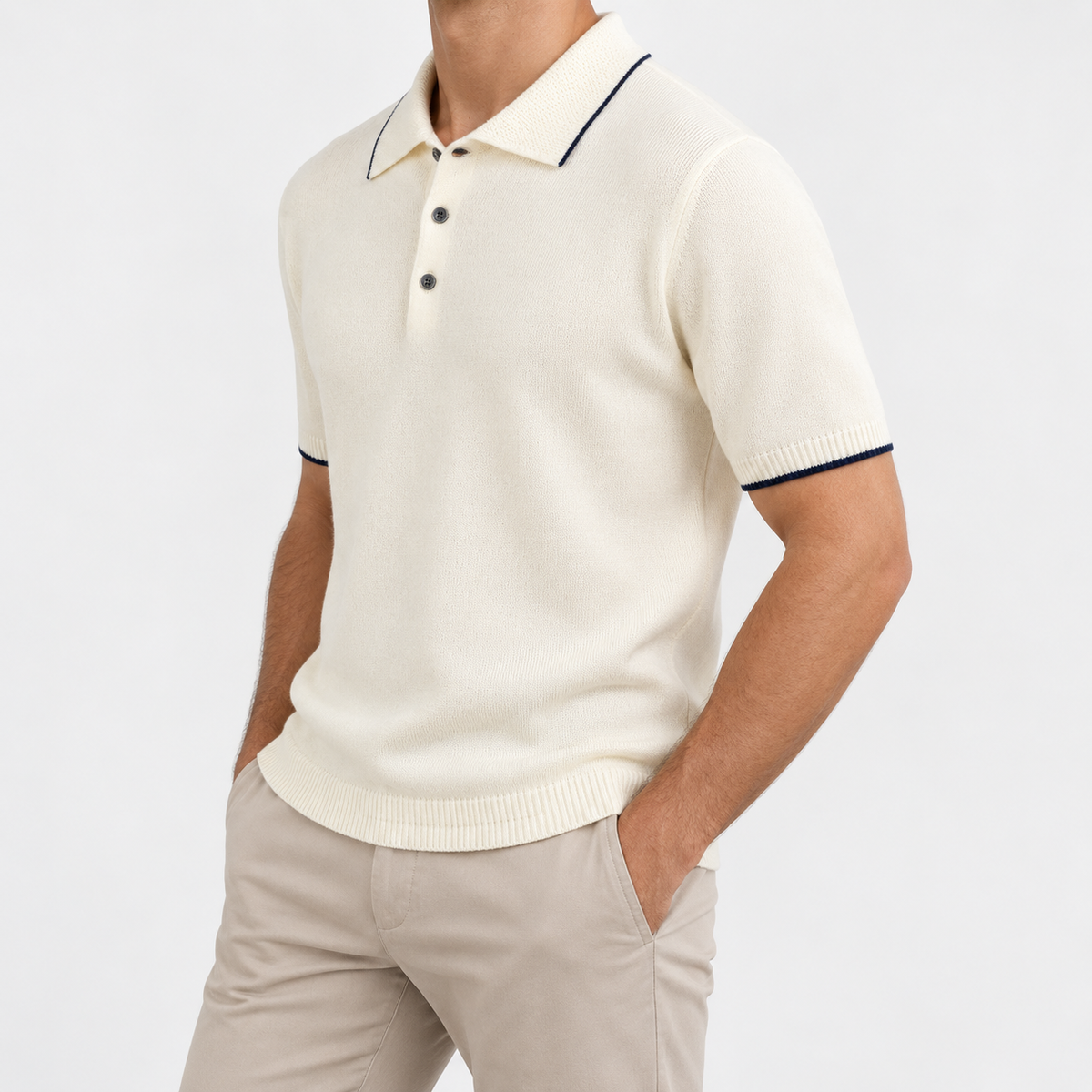 Merino wool polo with contrast trim in off white, side view on a model