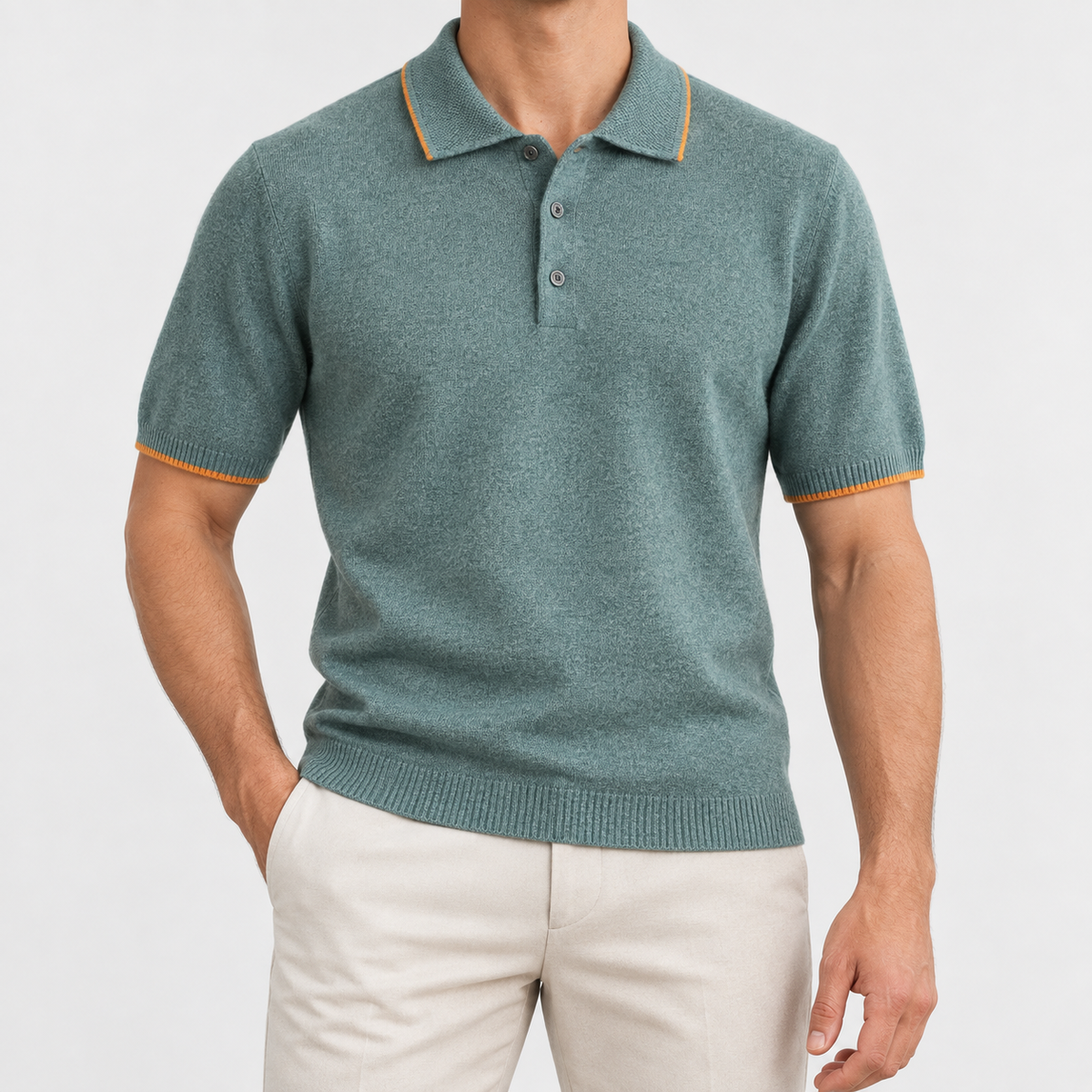 Merino wool polo with contrast trim in sage green, front view on a model