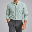 Ramon button-down shirt in green sage, front view on a model
