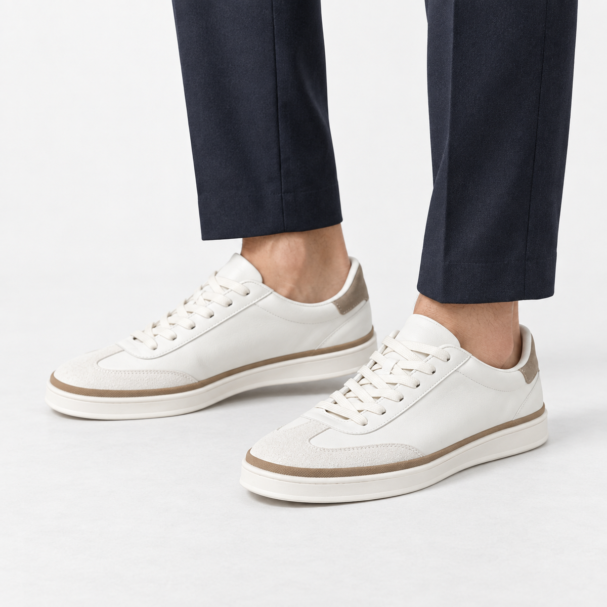 Retro leather sneakers with contrast soles in white white sole, side view on a model