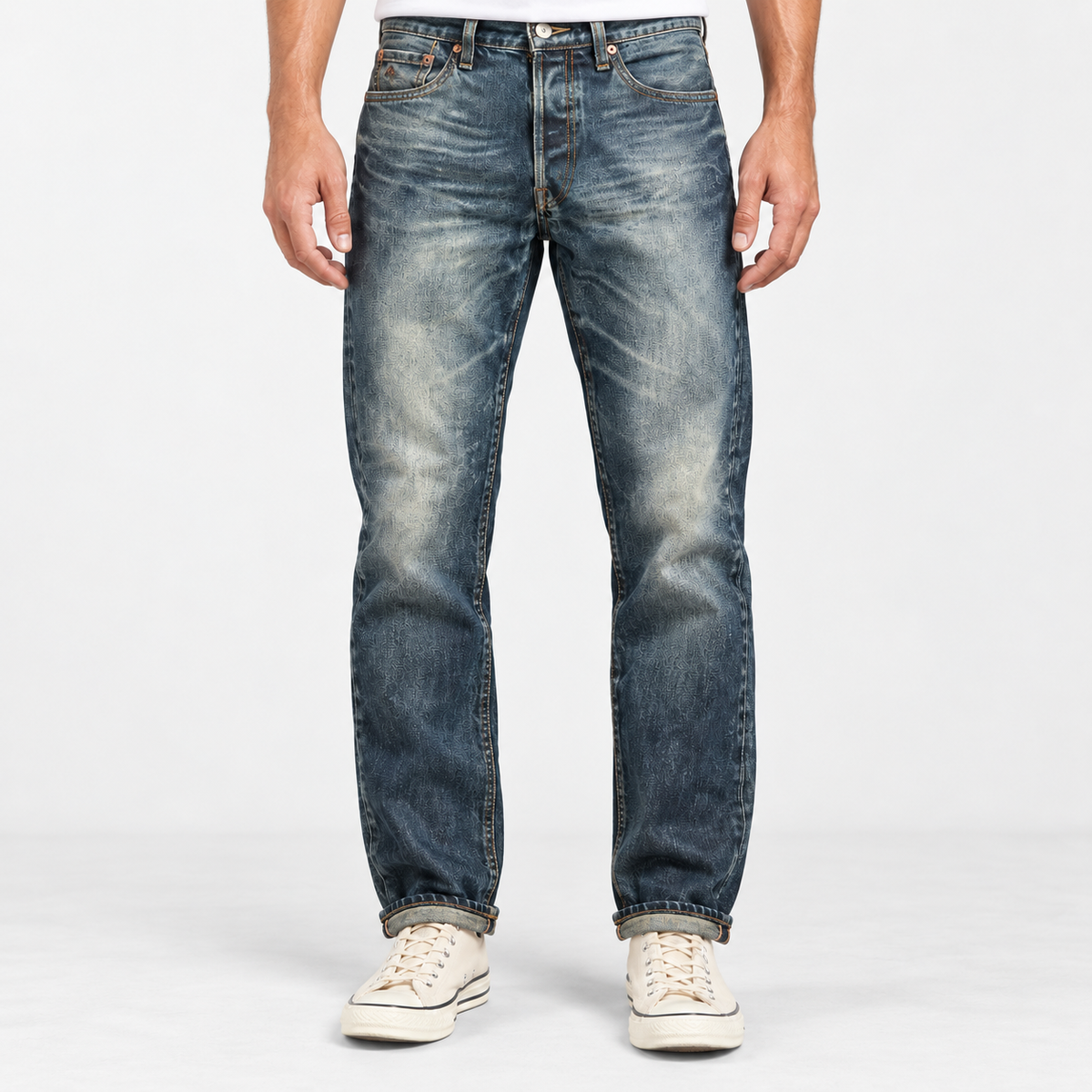 Stonewashed tapered cotton blend jeans in stonewashed blue, front view on a model