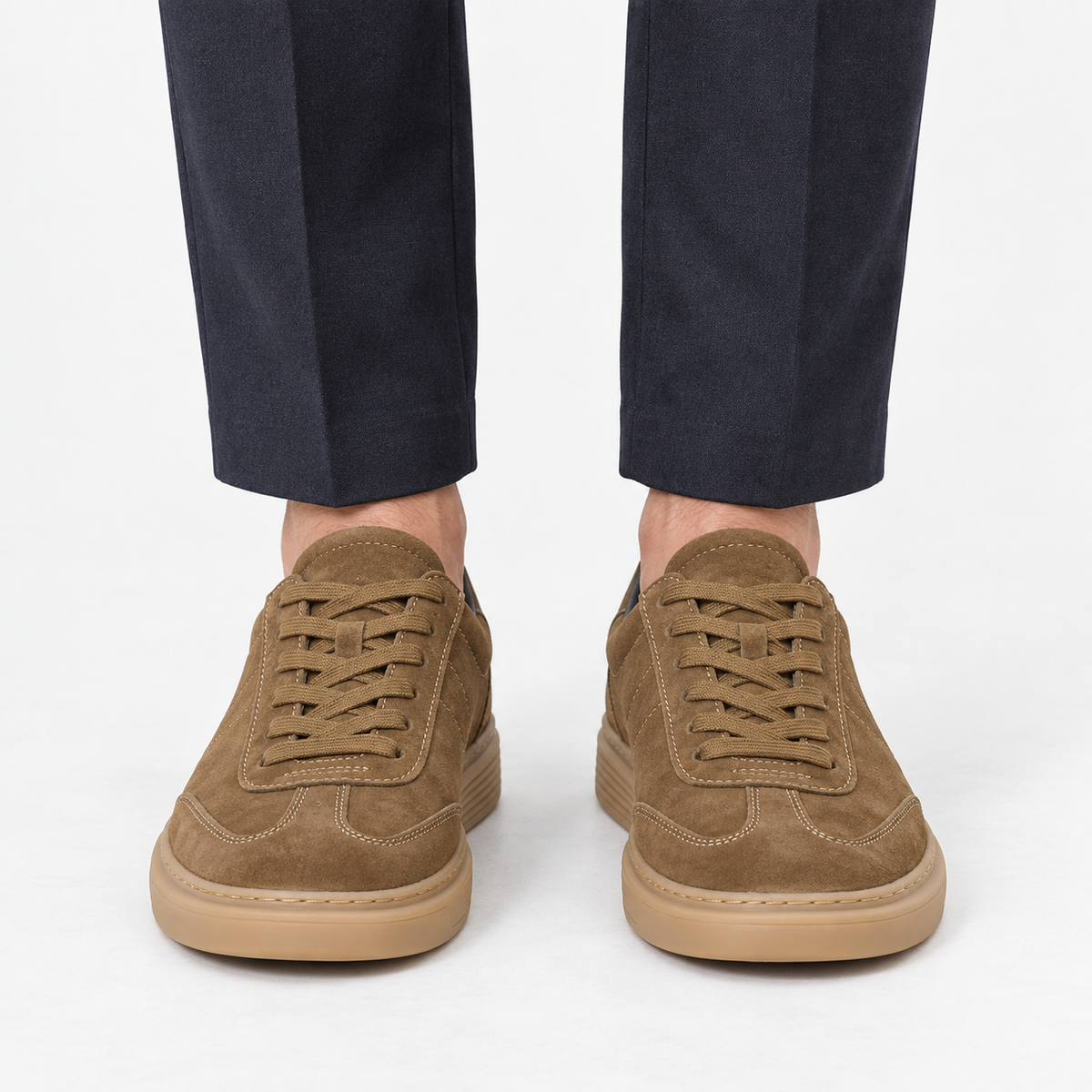 Suede cupsole sneakers with tonal laces in khaki, front view on a model