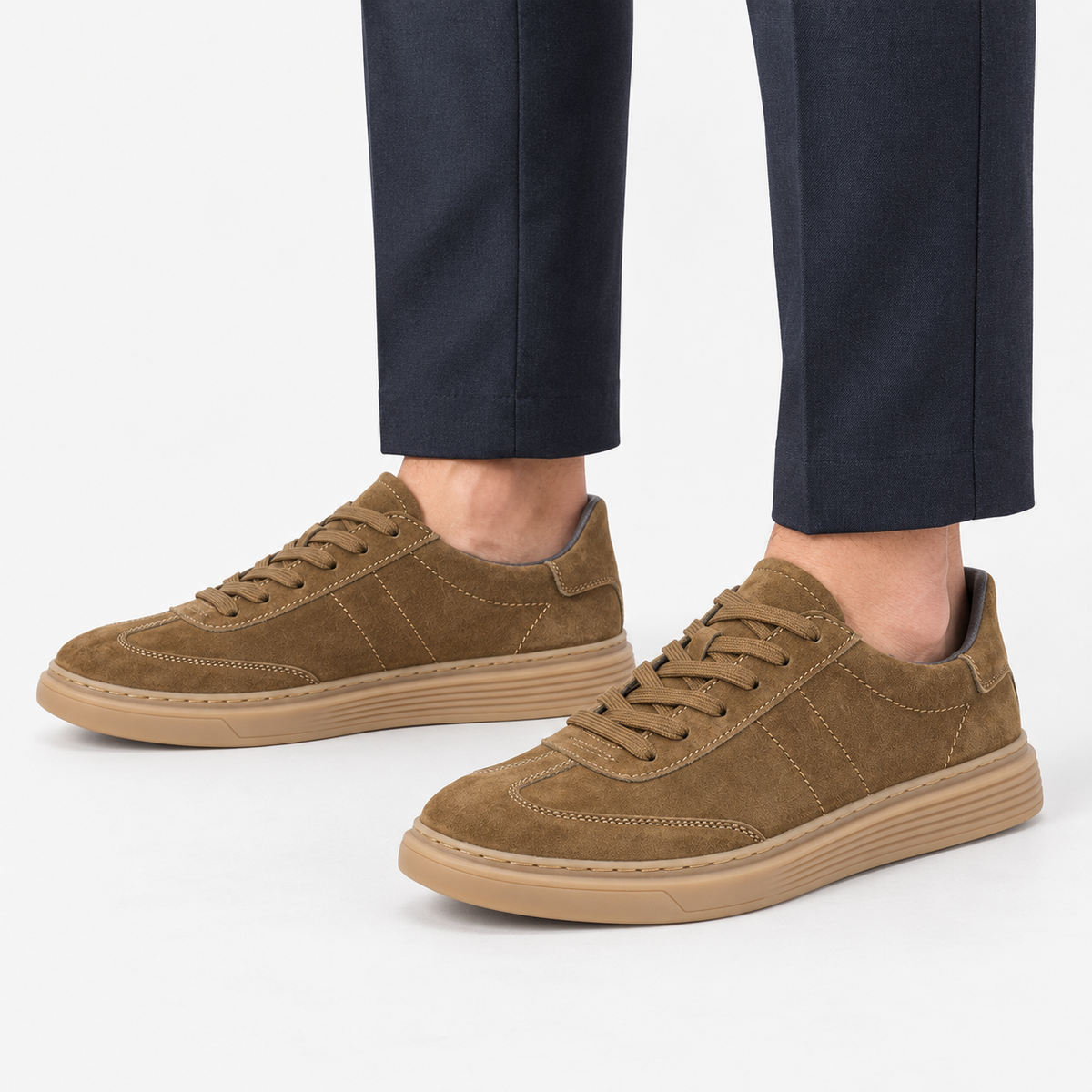 Suede cupsole sneakers with tonal laces in khaki, side view on a model