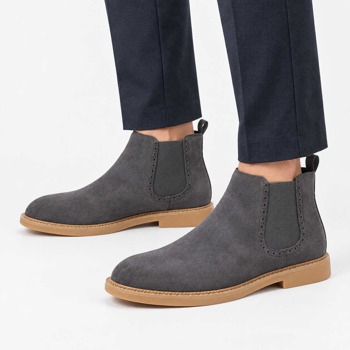 Suede finish leather chelsea boots in gray, side view on a model