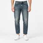 Vintage wash slim straight jeans in blue cropped, front view on a model