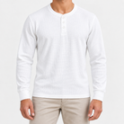Waffle knit long sleeve henley in white, front view on a model