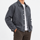 Washed cotton chore jacket in gray, side view on a model