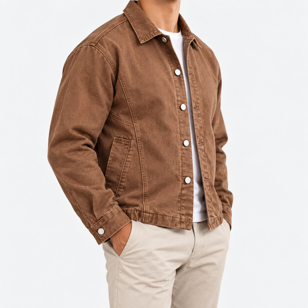 Washed cotton chore jacket in tobacco brown, side view on a model
