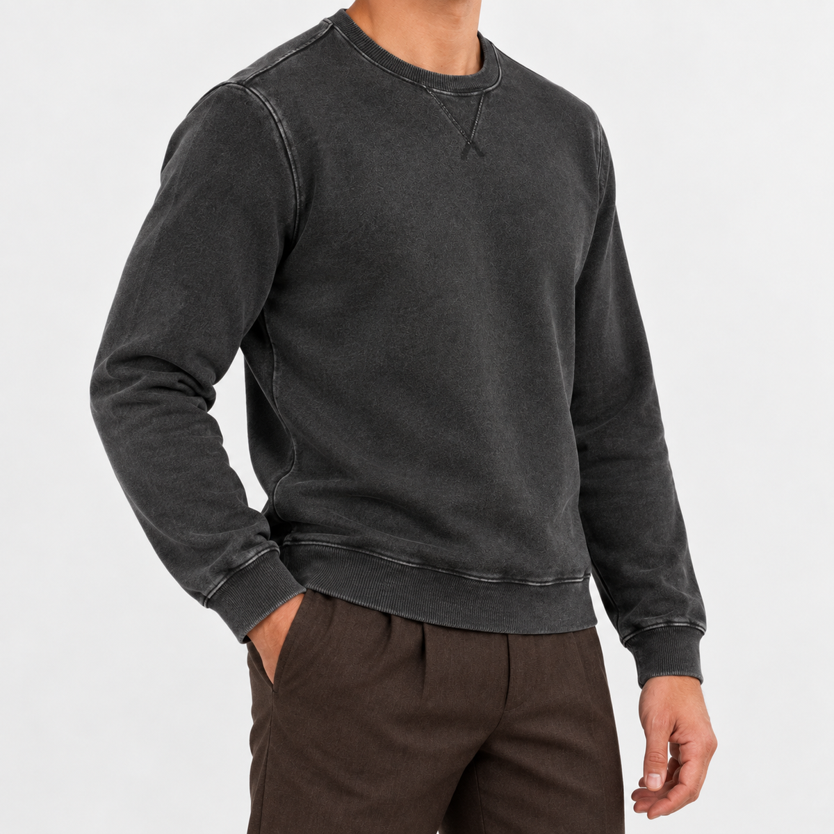Washed cotton crew neck sweatshirt in washed black, side view on a model