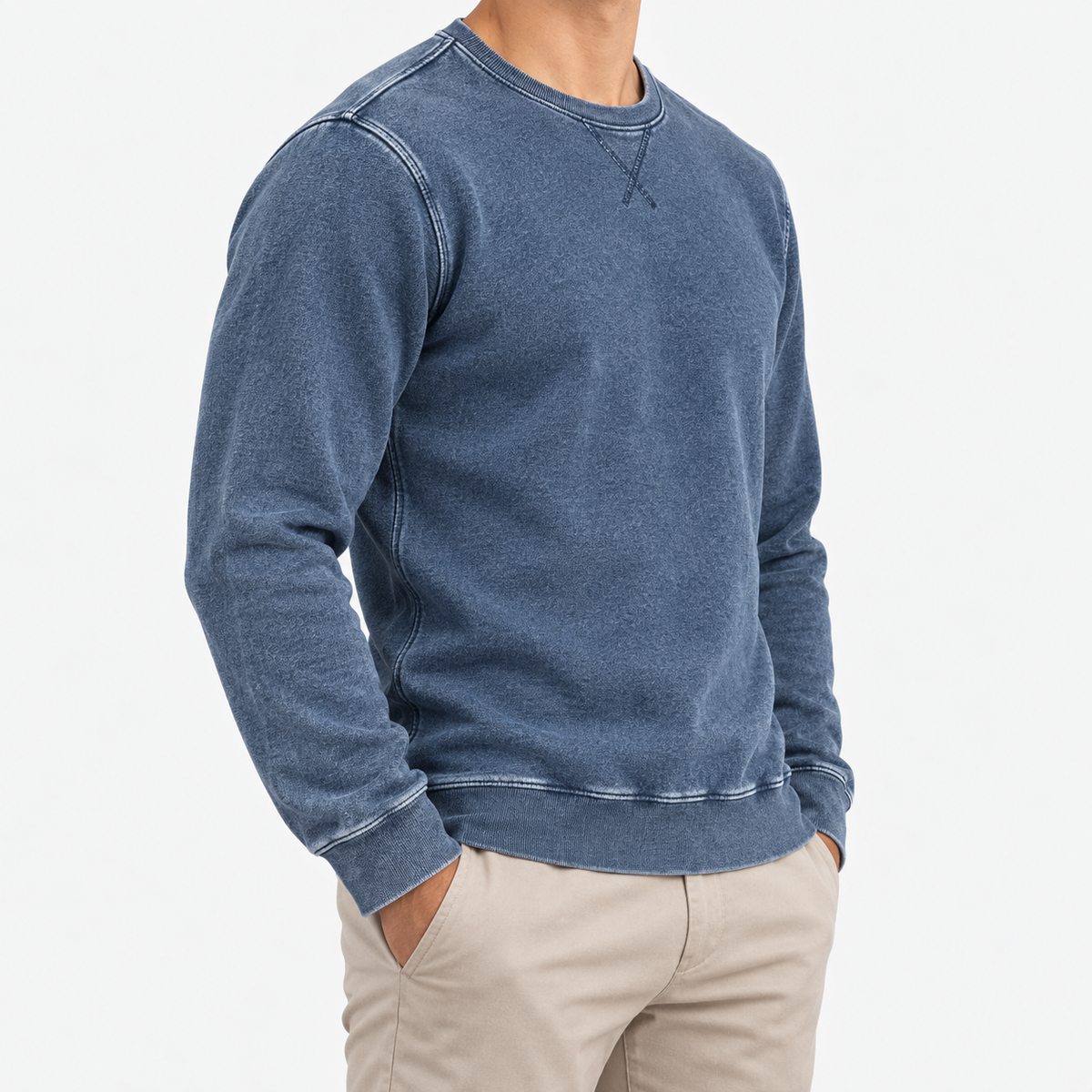 Washed cotton crew neck sweatshirt in washed blue, side view on a model